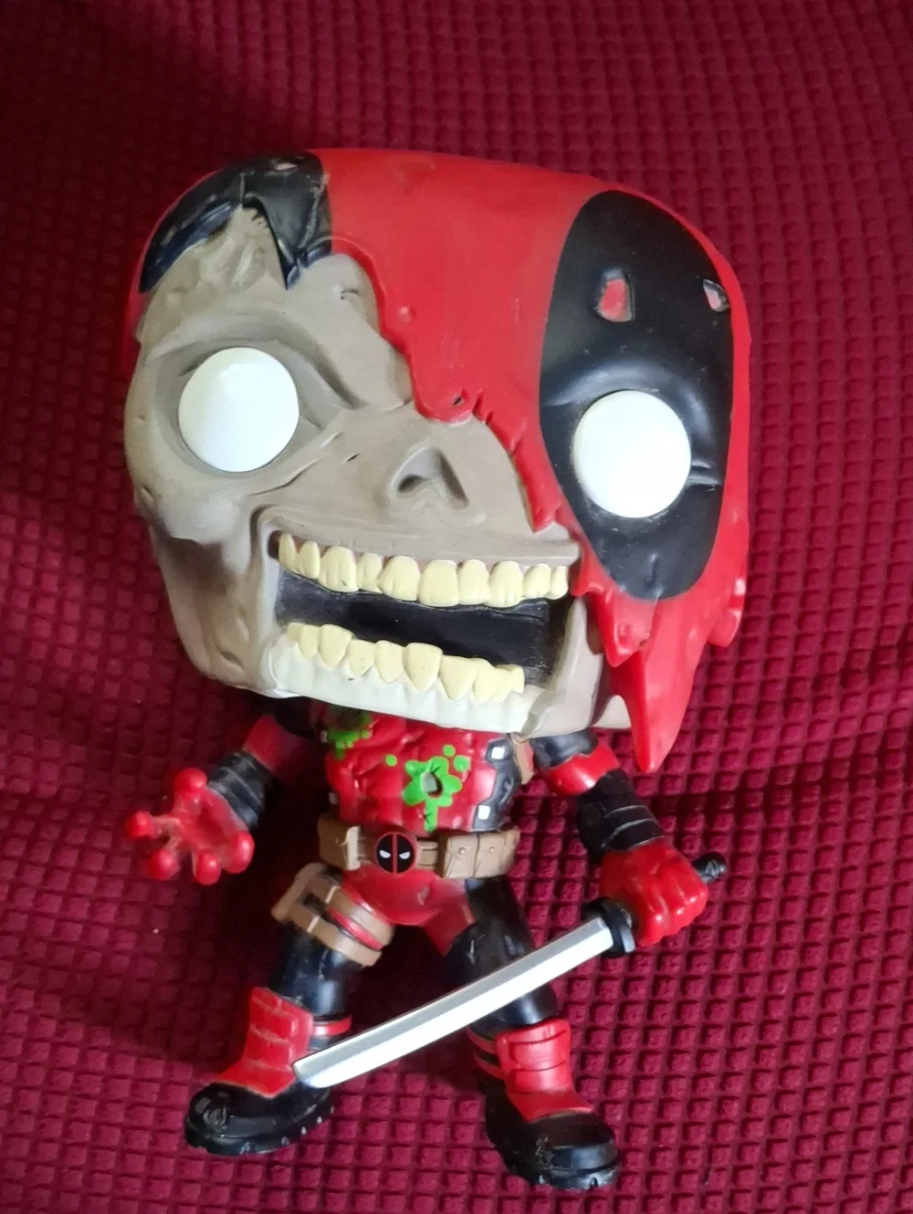 Deadpool Fynko Pop Red and Black Zombie-Style Action Figure with Sword